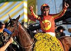 Martin Garcia won the 2010 Preakness aboard Lookin At Lucky.<br><a target="blank" href="http://www.bloodhorse.com/horse-racing/photo-store?ref=http%3A%2F%2Fpictopia.com%2Fperl%2Fgal%3Fprovider_id%3D368%26ptp_photo_id%3D8959664%26ref%3Dstory">Order This Photo</a>