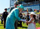 With England's Queen Elizabeth II attending for the first time since 1997, Big Red Mike stole the Queen's Plate with a gate-to-wire win.