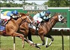 Gottcha Gold, Chuck C. Lopez aboard, holds off a late challenge by Lawyer Ron and John Velazquez to win the Salvator Mile.