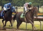 Funny Cide (5) crosses the finish line ahead of Johnie Bye Night (3) to win the 31st running of the Wadsworth Memorial Handicap at Finger Lakes.