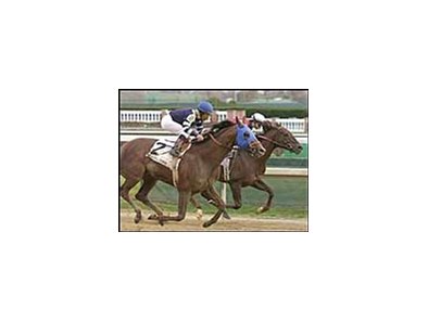 Lido Palace (#2) defeats Crafty Shaw to win the Clark Handicap.