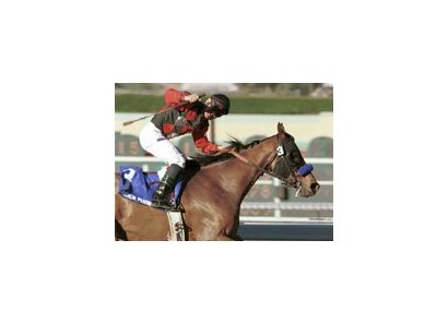 Jockey Corey Nakatani celebrates after winning the Strub Stakes with Wooden Phone.