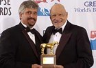 Steve Asmussen and Jess Jackson pose with Curlin's 2008 Horse of the Year Eclipse Award