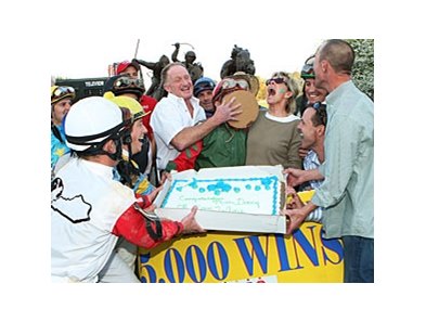 Tim Doocy is 'congratulated' for his 5,000th win.