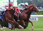 Cape Blanco holds off Dean's Kitten to win the Joe Hirsch Turf Classic Invitational.<br><a target="blank" href="http://www.bloodhorse.com/horse-racing/photo-store?ref=http%3A%2F%2Fpictopia.com%2Fperl%2Fgal%3Fprovider_id%3D368%26ptp_photo_id%3D9687643%26ref%3Dstory">Order This Photo</a>