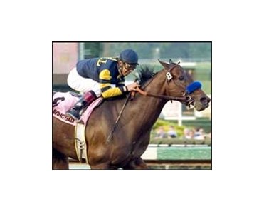 Behaving Badly and Victor Espinoza win the Santa Monica Handicap.