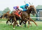 Adriano sweeps to the win in the Kent Stakes.