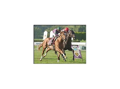 Green Fee, outside, wins the Kelso at Belmont Park.