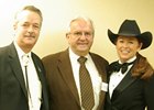 New Mexico state representative Candy Spence Ezzell (right), Dr. Leonard Blach (center), and Scott Scanland of Sunland Park celebrate Mine That Bird as New Mexico Horse of the Year for 2009.
