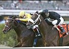Hard Buck, under Edgar Prado in yellow silks, defeats Balto Star in the Gulfstream Breeders' Cup Handicap.