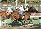 Robador, right, comes from behind to win the Cal National Snow Chief Stakes.
