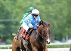 Mixed Up jumps strong in the A.P. Smithwick Memorial Steeplechase.<br><a target="blank" href="http://www.bloodhorse.com/horse-racing/photo-store?ref=http%3A%2F%2Fpictopia.com%2Fperl%2Fgal%3Fprovider_id%3D368%26ptp_photo_id%3D8748304%26ref%3Dstory">Order This Photo.</a>