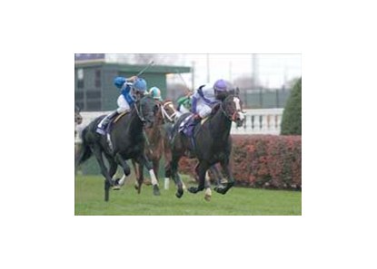 Red Rocks wins the John Deere Turf.<br><a target="blank" href="http://www.bloodhorse.com/horse-racing/photo-store?ref=http%3A%2F%2Fpictopia.com%2Fperl%2Fgal%3Fprovider_id%3D368%26ptp_photo_id%3D634100%26%26ref%3Dstory">Order This Photo</a>