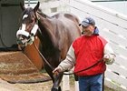 Rachel Alexandra is led off the van by Scott Blasi upon her return to Churchill Downs from Pimlico.
