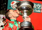 Frankie Dettori celebrates winning the Hong Kong Jockey's Challenge.