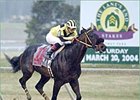Sinister G wins the Lane's End Stakes Saturday at Turfway Park.