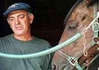 Owner/trainer Felix Monserrate, with Zippy Chippy.