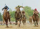 The trifecta in the 2007 Preakness was the same as the Derby, but in a different order.<br><a target="blank" href="http://photos.bloodhorse.com/TripleCrown/Older-Triple-Crown-Images/Past-Preakness-Stakes-Winners/i-2CB6zQc">Order This Photo</a>