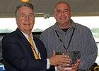 Tom LaMarra accepts the Old Hilltop Award.