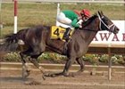 Unheralded Unbridled Belle and Ramon Dominguez prevail by 7 3/4 lengths in Delaware romp.<br><a target="blank" href="http://www.bloodhorse.com/horse-racing/photo-store?ref=http%3A%2F%2Fpictopia.com%2Fperl%2Fgal%3Fprovider_id%3D368%26ptp_photo_id%3D1730647%26ref%3Dstory">Order This Photo</a>