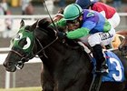 Unusual Suspect and Corey Nakatani takes the Hollywood Turf Cup.