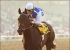 Halfbridled, ridden by Julie Krone, leads the field en route to winning the Oak Leaf Stakes Sunday at Santa Anita.