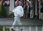 The rains came to Churchill Downs on Oaks Day.
