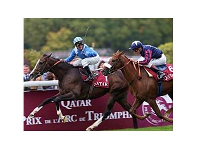 Davy Bonilla celebrates as Naaqoos wins the Prix Jean-Luc Lagardere (Grand Criterium) (Fr-I).