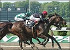 Storm Flag Flying, front, leads the field en route to winning the the Shuvee Stakes at Belmont Park.