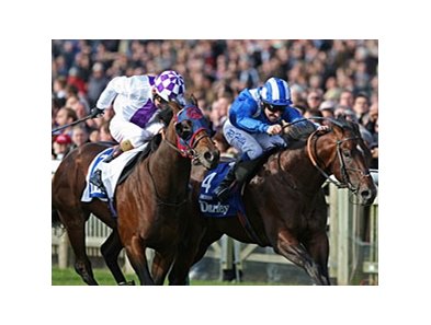 Intense Focus (left) fights for the win in the Darley Dewhurst Stakes.