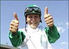 Emma-Jayne Wilson has two thumbs up and a big smile after historic win in Canada's prestigious Queen's Plate.