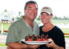Trainer Joe Orseno celebrates a perfect 5-for-5 day with Michelle Congelosi, DVM at Gulfstream Park April 7.