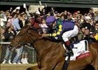Bushfire, with jockey Cornelio Velasquez aboard, wins the Ashland, Saturday at Keeneland.