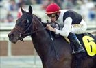 Society Hostess gives jockey Garrett Gomez a sweep of the New Year's Day graded stakes at Santa Anita with this Monrovia Handicap win.
