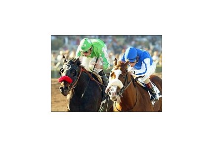Spanish Chestnut, right, holds off Iced Out to win the San Rafael Stakes, Saturday at Santa Anita.