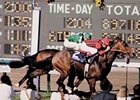 Manila held off Theatrical to win the 1986 Breeders' Cup Turf at Santa Anita.