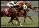 Inesperado (5) passes Regiment en route to victory in the Cinema Handicap.