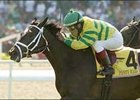 Edgar Prado rides Panty Raid to the win in the American Oaks.<br><a target="blank" href="http://www.bloodhorse.com/horse-racing/photo-store?ref=http%3A%2F%2Fpictopia.com%2Fperl%2Fgal%3Fprovider_id%3D368%26ptp_photo_id%3D1643264%26ref%3Dstory">Order This Photo</a>