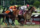 Most Distinguished rallies to victory in the Amsterdam.
<br><a target="blank" href="http://www.bloodhorse.com/horse-racing/photo-store?ref=http%3A%2F%2Fpictopia.com%2Fperl%2Fgal%3Fprovider_id%3D368%26ptp_photo_id%3D1857335%26ref%3Dstory">Order This Photo</a>