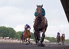 Midnight Cello runs away from the competition in the Hanshin Cup Stakes.