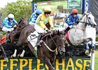 Choral Society (right) upsets the A. P. Smithwick Memorial Steeplechase.<br><a target="blank" href="http://photos.bloodhorse.com/AtTheRaces-1/At-the-Races-2015/i-THgfWZF">Order This Photo</a>