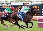Andrasch Starke celebrates the American St. Leger victory with Lucky Speed.