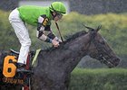 Lochte and Matthew Rispoli take the Tropical Turf Handicap in the rain.<br><a target="blank" href="http://photos.bloodhorse.com/AtTheRaces-1/At-the-Races-2015/i-pxBTVKm">Order This Photo</a>