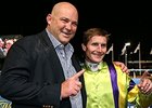 Trainer Peter Moody (left) celebrates with jockey Brad Rawiller after Flamberge's win in the Mitchelton Wines William Reid Stakes.