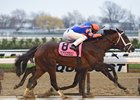 Outwork winning the Wood Memorial Stakes (gr. I)
