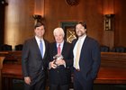 Jay Hickey (center) receives Rolapp Award from Brian (left) and Todd Rolapp.