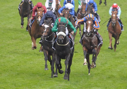 HARZAND (IRE) (P.J.Smullen) winning The Derby Stakes (G1)(3yo colts & fillies) beating US Army Ranger (IRE) (dark blue) and Idaho (IRE)(striped cap)