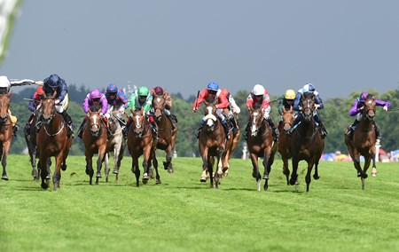 Even Song (left, dark blue silks) wins the 2016 Ribblesdale Stakes at Royal Ascot on June 16, 2016.