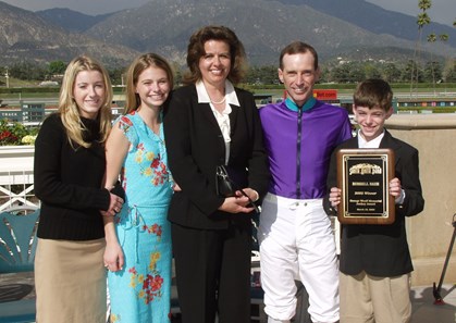 Jockey Russell Baze and family accept the George Woolf Memorial Jockey Award March 15, 2002, at Santa Anita Park.