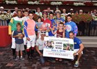 Jose Ortiz celebrating his 1000th win